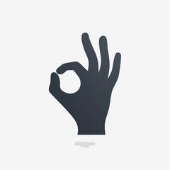 Obraz premium Hand gesture making an ok sign on a white background