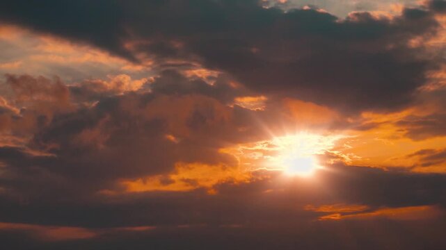 Cumulus clouds in sky during sunset with mountain. Time lapse landscape