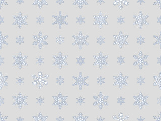 Seamless repeating pattern of snowflakes outlines of varying sizes and designs in dark blue color, on a light grey background.
