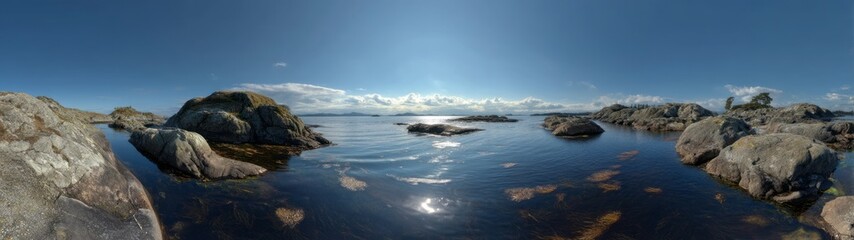Fototapeta premium Serene coastal hdr panorama of rocks and water scenic nature view