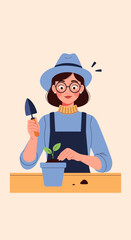 Woman in hat gardening and planting a seedling in a pot