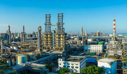 A large oil refinery and petrochemical plant with complex equipment in industrial area © ABCDstock