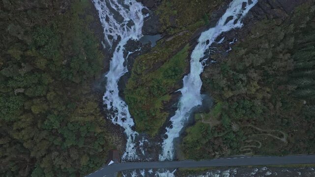 Aerial shot of Latefossen Waterfall over dramatic Norway terrain