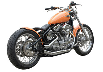 Isolated orange motorcycle, a retro chopper with chrome parts on a blank backdrop