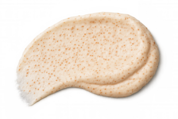 Cosmetic scrub or exfoliator texture smear, beige cream swatch with particles, skincare beauty product concept with transparent background