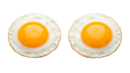 Two sunny side up eggs with bright yellow yolks and white edges on Transparent Background