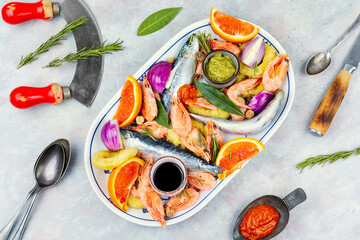 Fresh seafood and marinade.