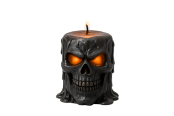 Sinister black skull candle melting with a wide spooky grin and bright burning orange eyes a great prop for a halloween theme isolated on transparent background