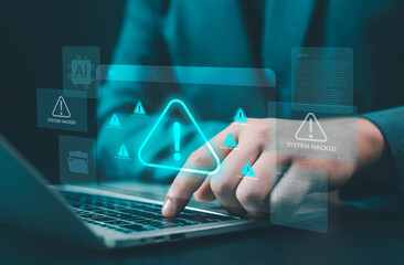 Cybersecurity alert on laptop screen showing system hacked and warning icons, representing data breach, cyber attack, malware, and network security risk in digital technology cybersecurity, digital