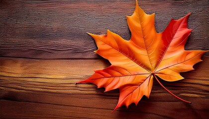Obraz premium Fall Maple Leaf On Wooden Table Background Texture