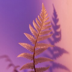 Fern leaf against gradient background