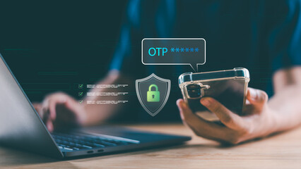 A person uses OTP verification on a smartphone to securely log in on a laptop, showcasing digital identity protection through two-factor authentication and modern cybersecurity practices.