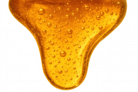 Golden honey dripping down with air bubbles, sweet natural syrup close up. Liquid food ingredient on transparent background