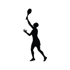 silhouette of a tennis player serving a ball