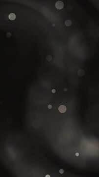 Abstract black background with blurred bokeh lights. 4K Video Potrait