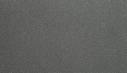 Dark engraved metal background. Engraved metal sheet texture. Engraved metal surface. Close up.