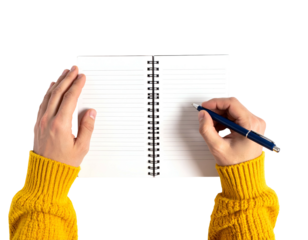 Overhead view of hands writing in notebook with pen, wearing yellow sweater