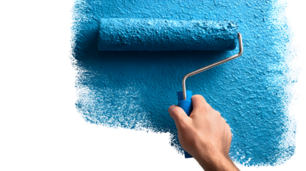 Close-up of hand painting a wall with blue paint roller for home renovation