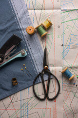 sewing supplies on the table in the designer's workshop