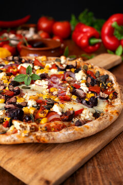 Spicy Mexican Style Vegetarian Pizza with Kidney Beans and Colorful Vegetables