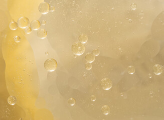Abstract yellow water bubbles oil background