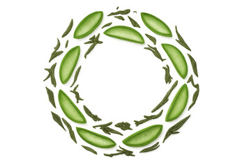 Aloe vera slices and dried green tea leaves arranging in a decorative round shape, ideal for natural beauty and wellness designs