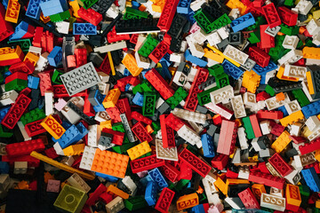 Obraz premium Prague, Czechia - September 20, 2025: Colorful pile of assorted lego plastic construction bricks