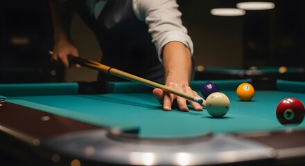 focused person aiming cue stick on billiards table