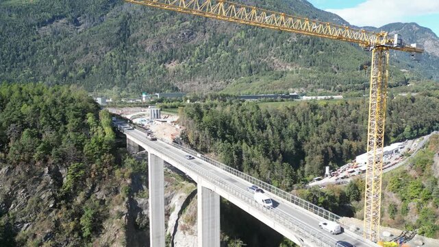 Ponte Riga near Varna and the A22, with the famous Brenner Base Tunnel construction site in the background, merging engineering and Alpine scenery.