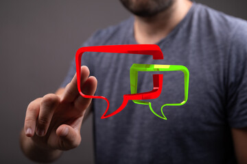 Person interacts with digital speech bubbles, conveying dialogue, conversation, and the power of...