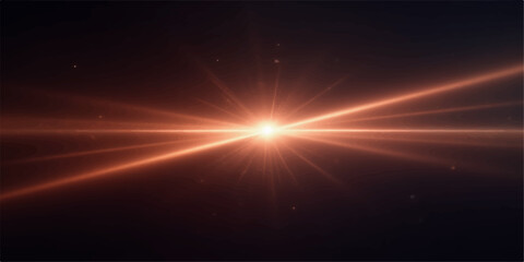 Bright orange starburst light flare with radial beams emanating from a central point against a dark background