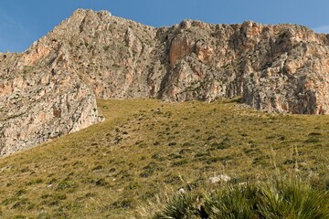 Limestone massif of Monte Cofano 657 meters high in Mount Cofano nature reserve on Sicily island. Italy. Europe.