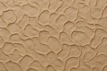 Organic clay texture background in soft beige tones