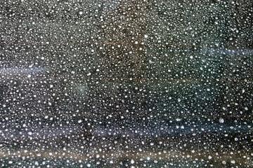 Dirty car glass, rain texture.