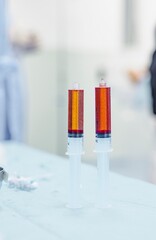 Brightly colored microspheres are prepared for use in an advanced tumor treatment procedure