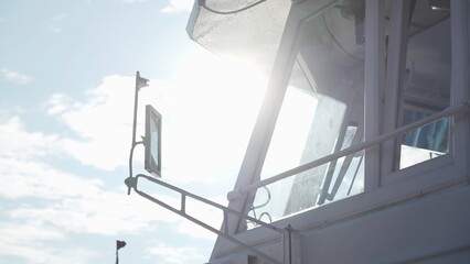 Ship wheelhouse detail with sun flare. Clip © mediawhalelicensing 