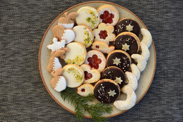 Various kinds of cookies arranged on a plate. Christmas baking