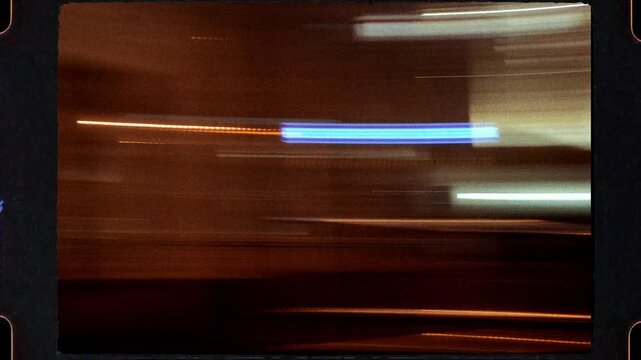 Driving fast through city streets at night