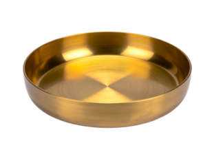 A round, golden bowl with a wide, shallow interior, sitting on a black background
