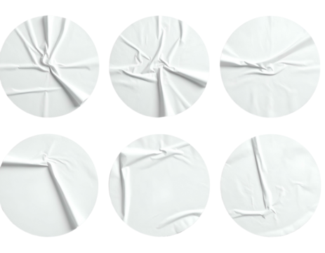 Six white circular stickers with varying degrees of crinkles and folds, set against a dark backdrop