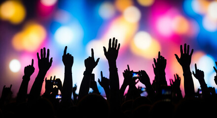 Crowd hands with arms raised up at a concert with colorful bokeh lights in the background, celebrating a music event at a party