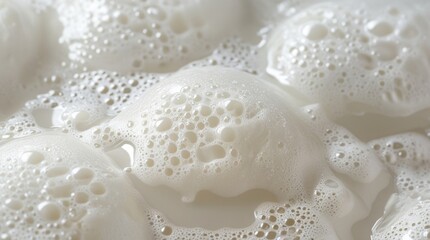 Soap foam or shampoo bubbles texture isolated with clipping path on background. Fresh, clean bubble surface close-up