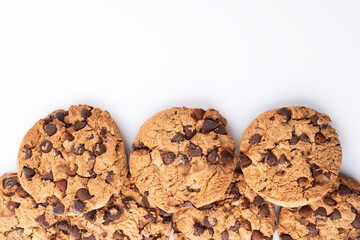 Chocolate chip cookies on a white background. Copy space for advertising space.