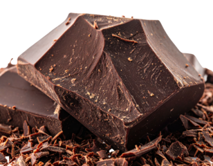 Macro shot of dark chocolate pieces with shavings, perfect for sweet treats and cravings