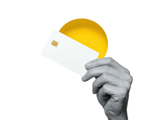 A grayscale hand holds a white credit card with a yellow circle behind it