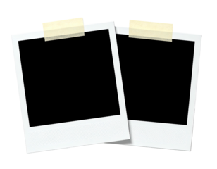 Two blank instant photo frames with tape, ready for pictures