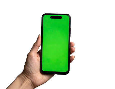 A person's hand holding a modern smartphone with a green screen against a black background - Powered by Adobe