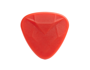 A bright red, textured, triangular plectrum isolated on a stark black background