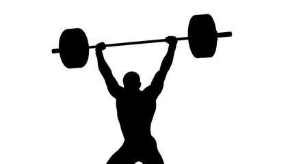 Powerful athlete triumphantly lifts heavy barbell overhead in dynamic silhouette symbolizing strength and achievement