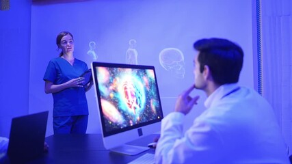 Doctors and medical professionals discuss preparing for physical and brain with futuristic hologram technology in a modern hospital setting - Powered by Adobe
